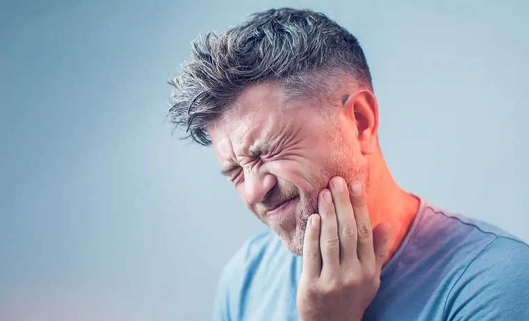 Man Experiencing Toothache