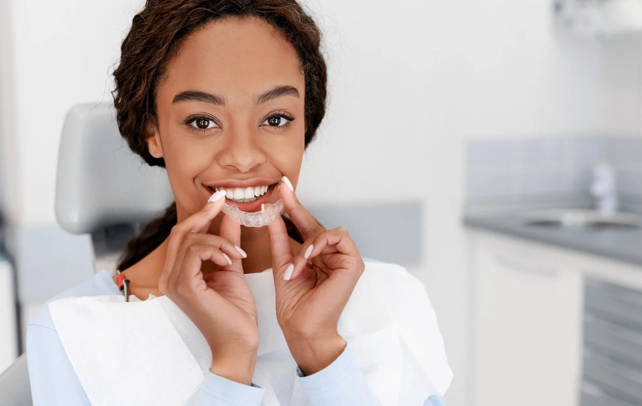 Patient Trying On Her Own Custom-Made Invisalign